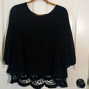Sheer black blouse,  lace detailing